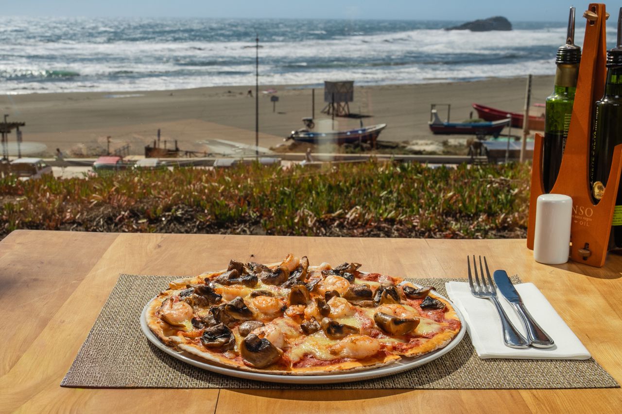 Pizza con vista a la playa